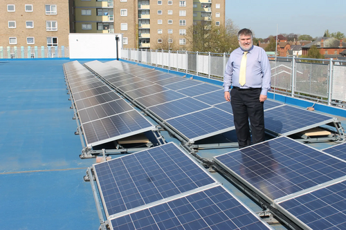 Mayor Dave Hodgson with solar panels