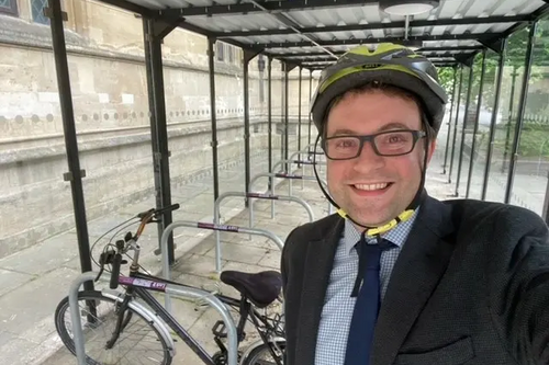 Councillor Henry Vann at the new bike shelter in Bedford Town Centre