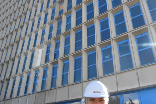 Dave Hodgson in front of The Heights apartments (former BT Building) 