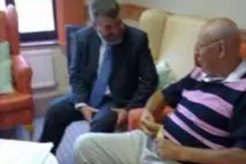 Dave Hodgson chatting to a resident at Maydenbury House