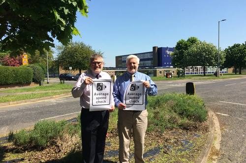 Mayor Dave Hodgson and Deputy Mayor Cllr Charles Royden with Average Speed Camera Signs on Polhill Avenue, Bedford