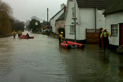 Members of the Fire and Rescue Service Come to the Aid of Flood-Hit Properties in Riseley