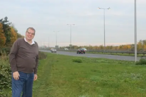 Cllr Tim Hill by the A6