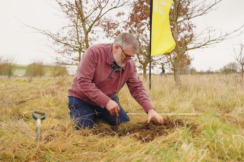 Mayor Dave Hodgson planting Midas Pattern trees at Shocott Spring