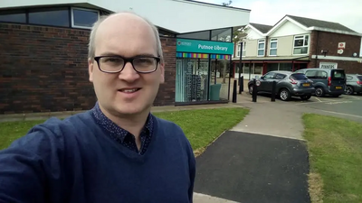 Councillor Michael Headley outside Putnoe Library