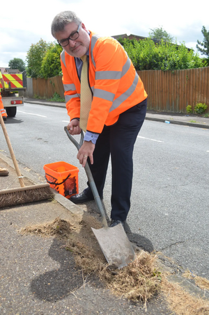 Mayor Dave Hodgson Helping to Clear the Weeds from the Highways