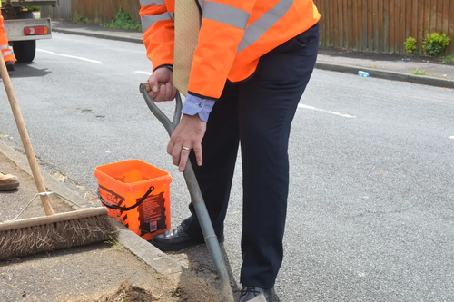 Mayor Dave Hodgson Helping to Clear the Weeds from the Highways