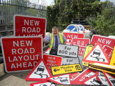 Mayor Dave Hodgson with signs removed in the first three months of Bedford Borough Council's Street Clutter campaign