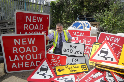 Mayor Dave Hodgson with signs removed in the first three months of Bedford Borough Council's Street Clutter campaign