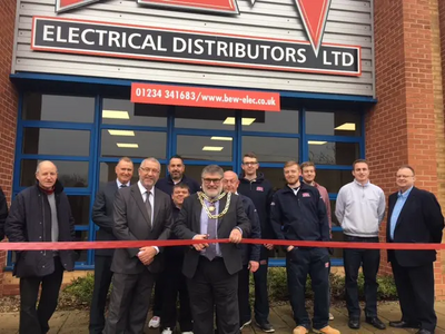 Mayor Dave Hodgson cuts the ribbon at the opening of Bedford branch of BEW Electrical Distribution