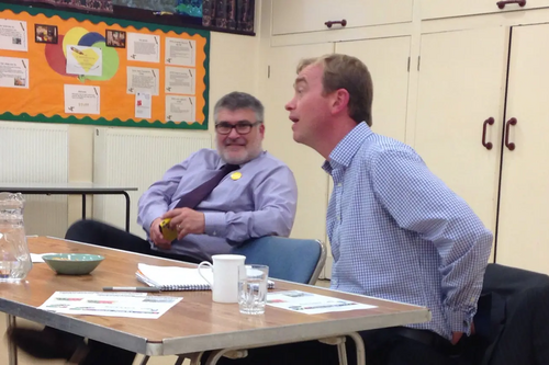 Tim Farron speaks to Liberal Democrat party members in Bedford, as Dave Hodgson looks on