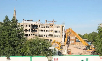 Bedford Town Hall office block mid-demolition