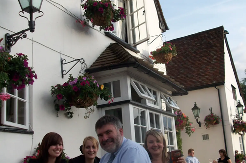 Mayor Dave Hodgson with Jo Dring of Charles Wells Ltd and Staff at the Fox and Hounds, Riseley