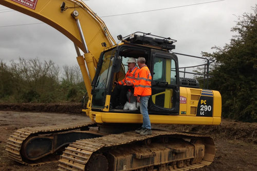 Mayor Dave Hodgson in the digger at the start of construction on the final phase of the Bedford Western Bypass