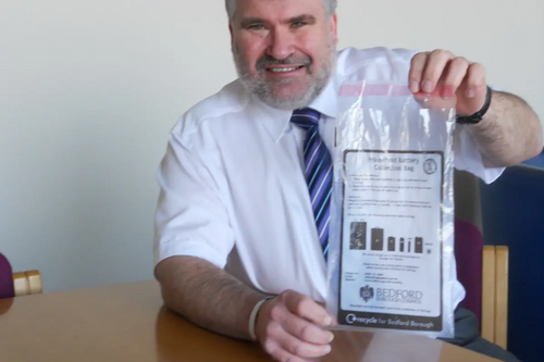 Mayor Dave Hodgson with new Bedford Borough Council battery recycling bags