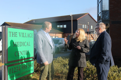 Mayor Dave Hodgson, Sir Ed Davey MP and Joanna outside Great Denham GP