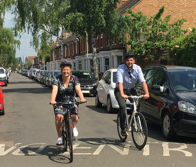 Cllr Hilde Hendrickx and Cllr Jake Sampson cycling