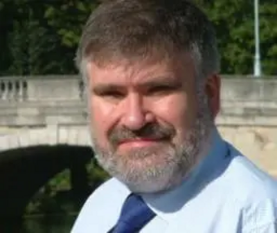 Dave Hodgson in front of the town bridge