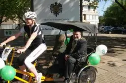 Mayor Dave Hodgson and Rebecca from Beds Road Cycling Club with Bike Week Rickshaw