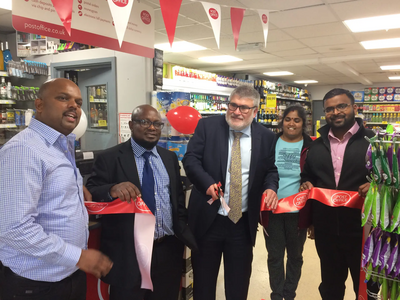 Mayor Dave Hodgson Cuts the Ribbon at the Reopening of the Queens Drive Post Office