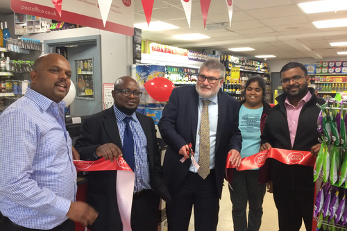 Mayor Dave Hodgson Cuts the Ribbon at the Reopening of the Queens Drive Post Office