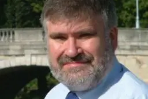 Dave Hodgson with Town Bridge behind