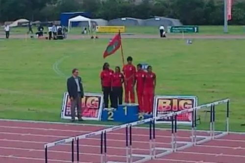 The Maldives Olympic Team are presented to the crowd at Bedford International Athletics Stadium after arriving in Bedford for their pre-games training camp