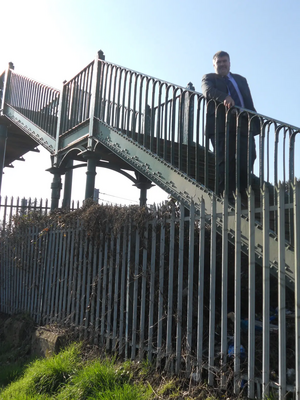 Dave Hodgson on the footbridge over the Bedford to Bletchley railway line on the riverside path in Bedford