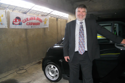 Dave Hodgson with his car after a dry 'Clean and Shiny' Car Wash by Day Centre Users