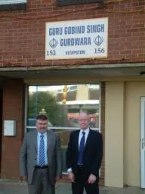 Cllr Dave Hodgson and Parish Councillor Mark Fitzpatrick outside the Guru Gobind Singh Gurdwara in Kempston