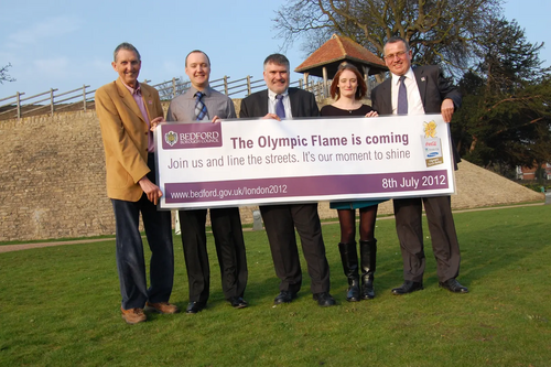 Howard Darbon, Matt Barber, Dave Hodgson, Katie Campling and Cllr Doug McMurdo celebrate the announcement of the Olympic Torch Relay route through Bedford Borough