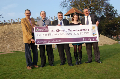 Howard Darbon, Matt Barber, Dave Hodgson, Katie Campling and Cllr Doug McMurdo celebrate the announcement of the Olympic Torch Relay route through Bedford Borough