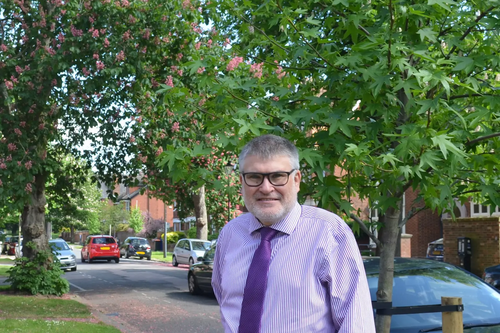 Mayor Dave Hodgson with newly-planted trees