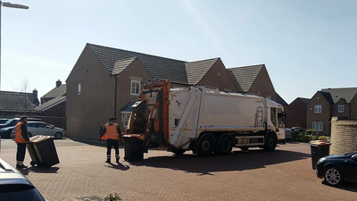 Bin collection crew working