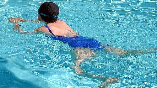 Woman swimming in a pool