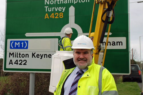 Mayor Dave Hodgson with M1 signage