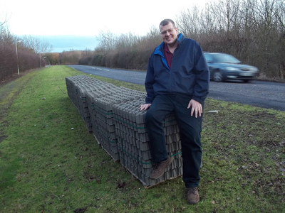 Cllr Hill with grasscrete in Stewartby