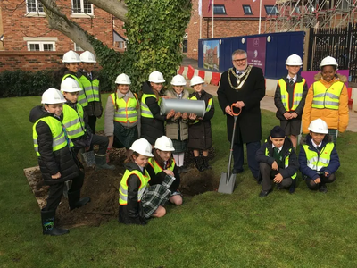 Mayor Dave at the Time Capsule burial at The Place in Kempston with children