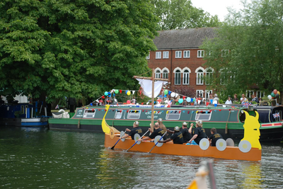 A dragon boat team at the Bedford River Festival