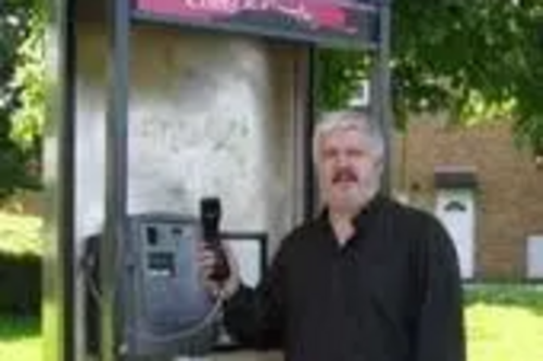 Cllr Charles Royden with Carron Road Payphone