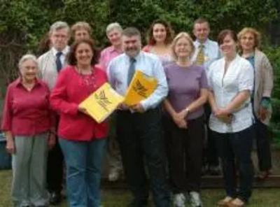 Group photo of Baroness Scott with Dave Hodgson and some of his team