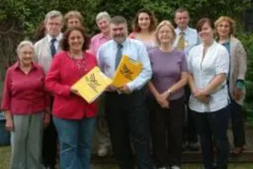 Group photo of Baroness Scott with Dave Hodgson and some of his team