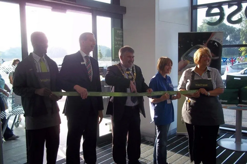 Mayor Dave Hodgson cuts the ribbon at Bedford's new Waitrose store