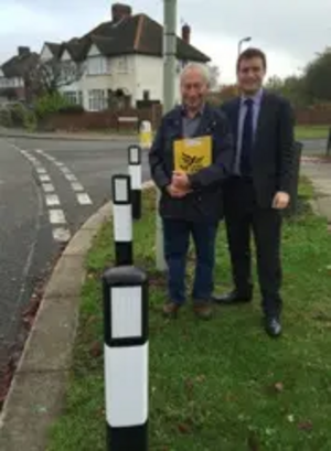 Cllr David Sawyer and Cllr Henry Vann with bollards at Chiltern Avenue and Putnoe Lane