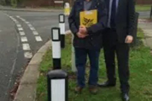 Cllr David Sawyer and Cllr Henry Vann with bollards at Chiltern Avenue and Putnoe Lane