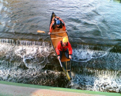 Paddlers Enjoying Duckmill Weir in Bedford