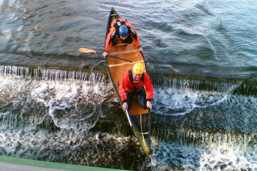 Paddlers Enjoying Duckmill Weir in Bedford