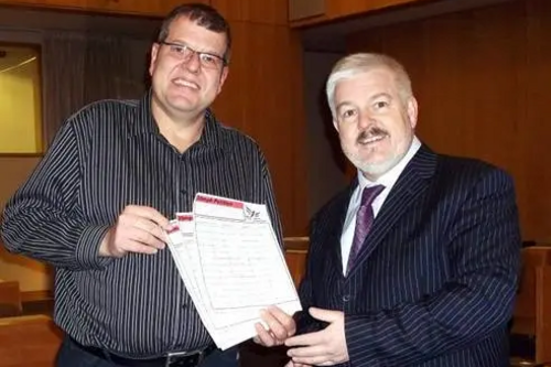 Cllr Tim Hill Presenting Cllr Charles Royden with Petition