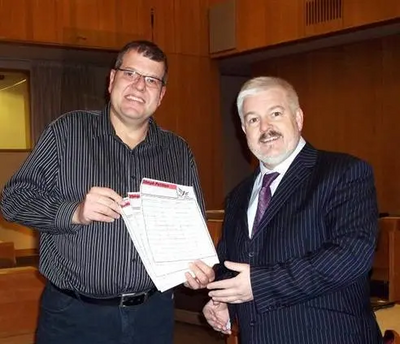 Cllr Tim Hill Presenting Cllr Charles Royden with Petition