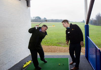 Mayor Dave Hodgson with Mowsbury Golf and Squash Centre club professional James Koncewicz at the refurbished driving range